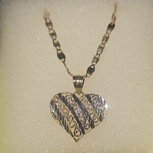 Elegant Gold and Silver Heart Pendant Necklace